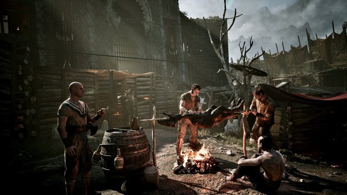 Screenshot z Gothic 1 Remake przedstawiający ludzi przy ognisku w Starym Obozie.